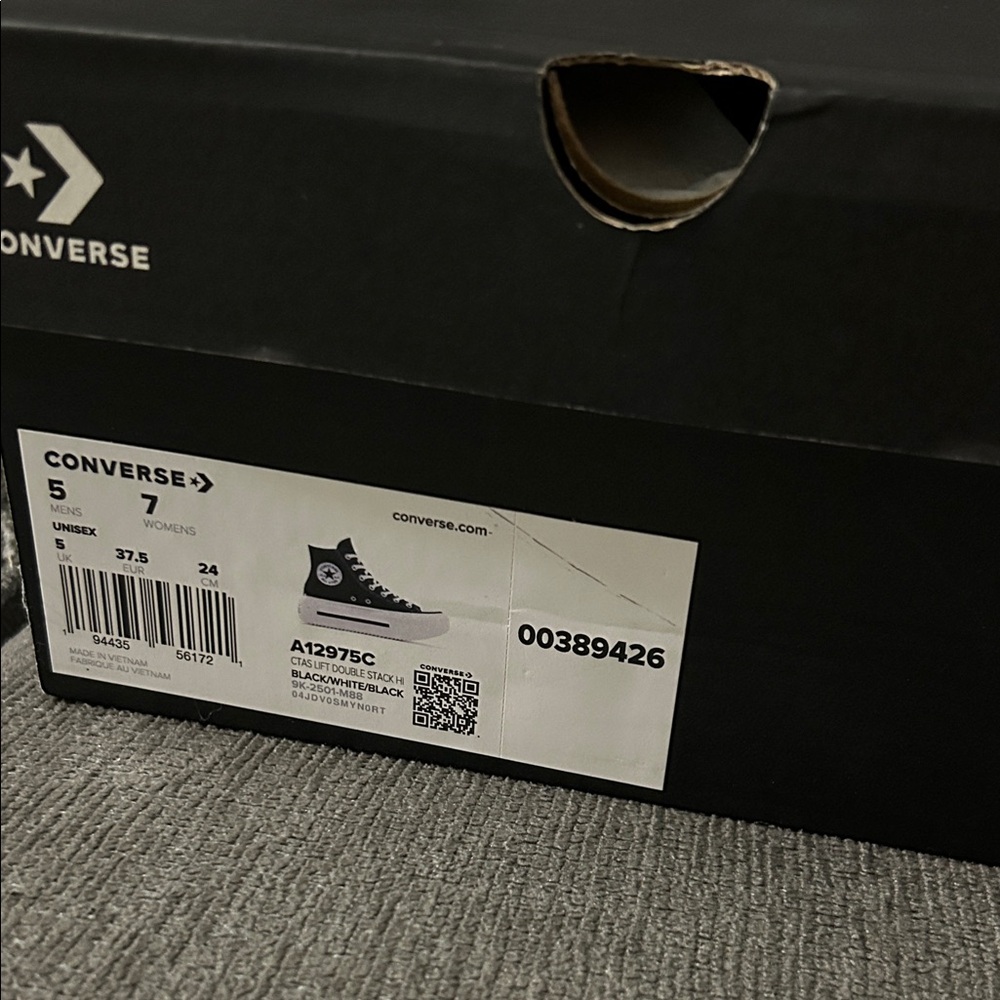 Converse Black and White High-Tops double stack